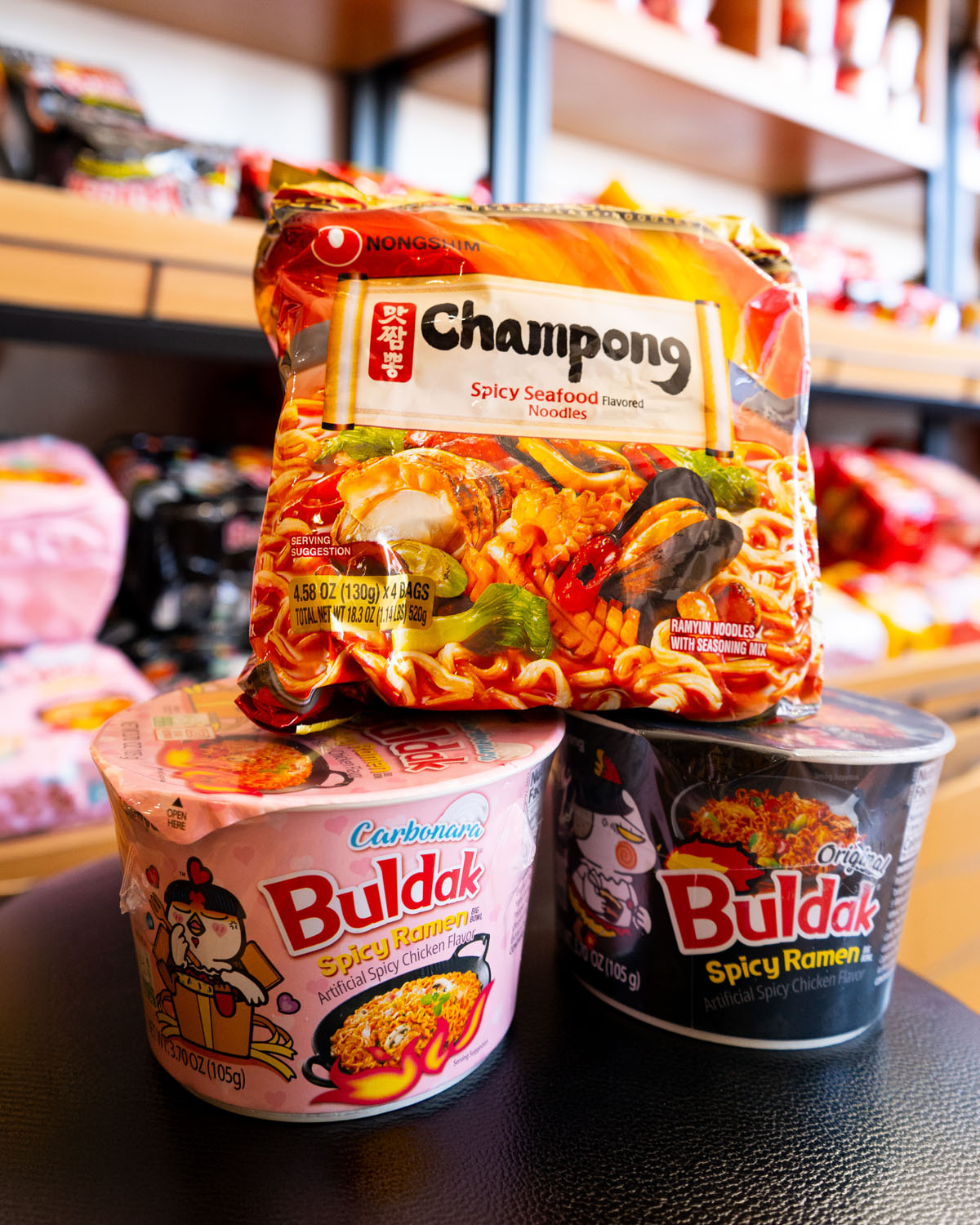 Inside Hayato Asian Market — colorful shelves of Asian snacks and goods